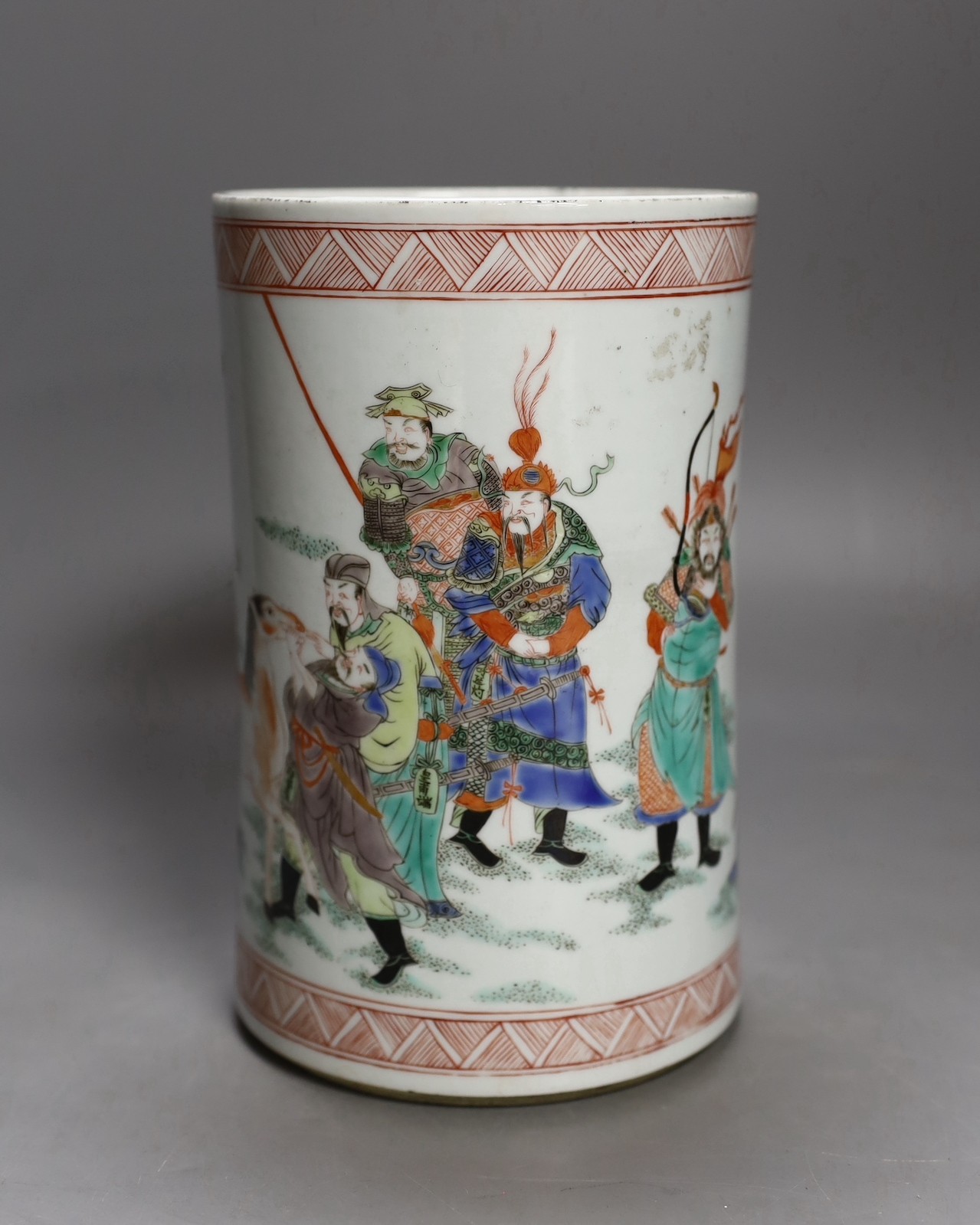 A Chinese famille verte brush pot, 19.5 cms high.